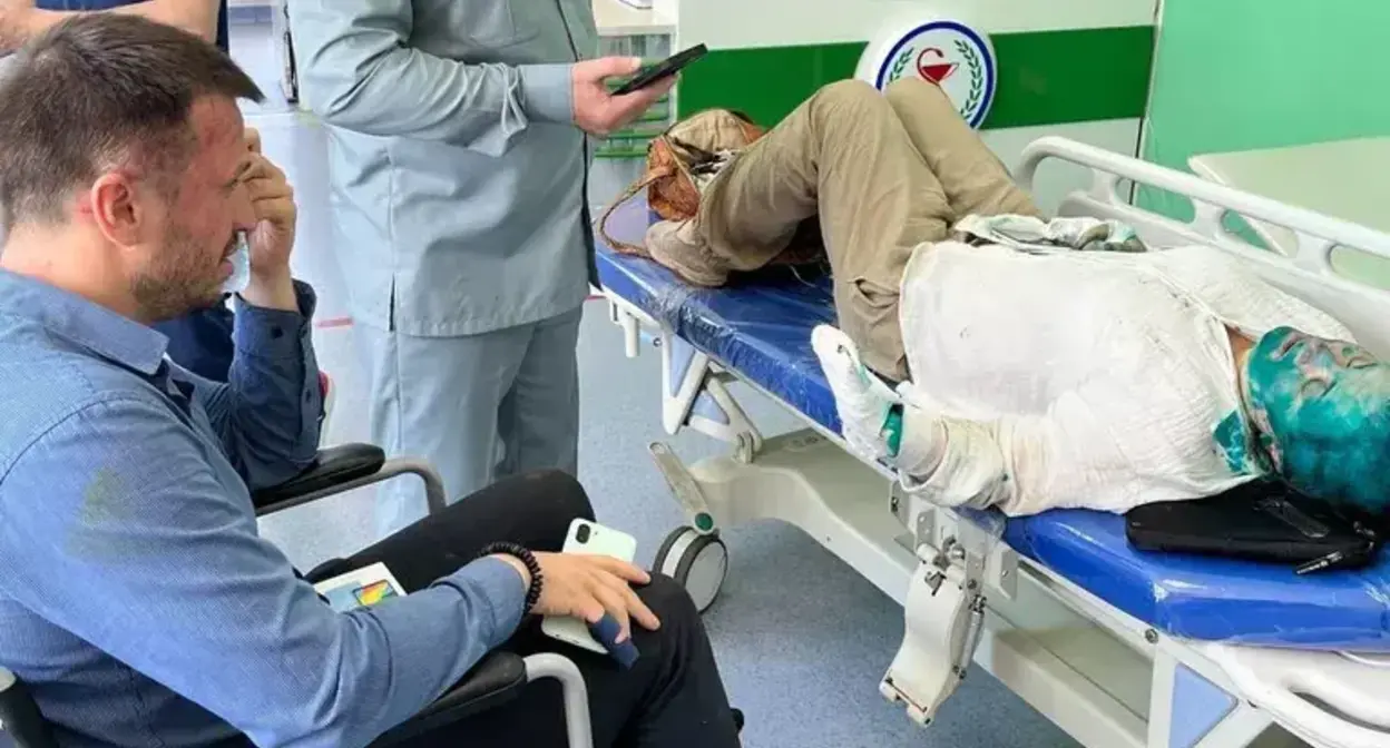 Alexander Nemov and Elena Milashina after being attacked. Photo: “Team Against Torture” / Telegram